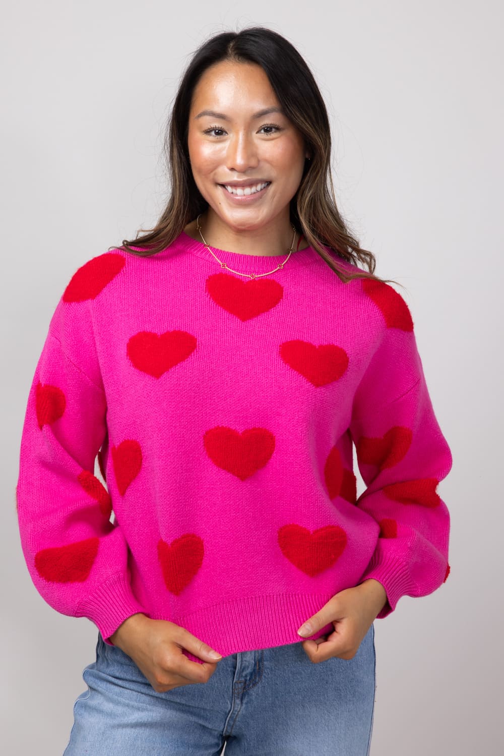 Pink sweater with red hearts hotsell