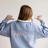 Bailey Rose Don’t’ Know Don’t Care Fleece Quarter Zip Sweatshirt for Women in Moody Sky