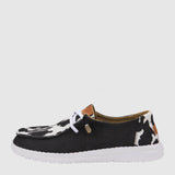 HEYDUDE Women’s Wendy Cow Print Shoes in Black/White