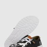 HEYDUDE Women’s Wendy Cow Print Shoes in Black/White