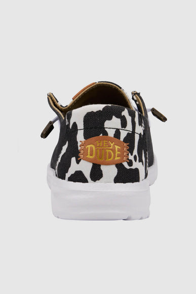 HEYDUDE Women’s Wendy Cow Print Shoes in Black/White