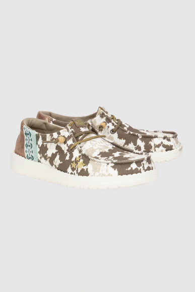 HEYDUDE Women’s Wendy Disco Cow Print Shoes in Tan