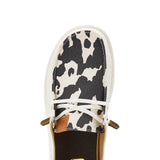 HEYDUDE Women’s Wendy Cow Print Shoes in White/Black