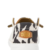 HEYDUDE Women’s Wendy Cow Print Shoes in White/Black