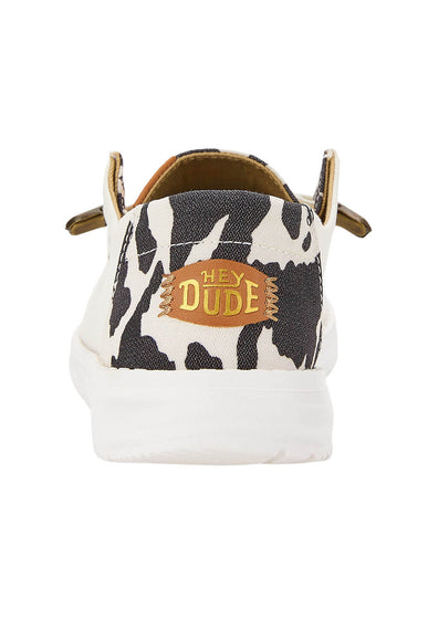 HEYDUDE Women’s Wendy Cow Print Shoes in White/Black