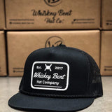 Whiskey Bent Black Top Trucker Hat for Men in Black